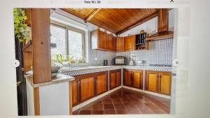 Kuchyň nebo kuchyňský kout v ubytování CASA DEL CORSO