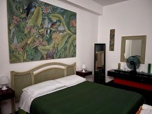 Postel nebo postele na pokoji v ubytování CASA DEL CORSO