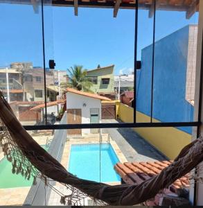 Bazén v ubytování Casa na Praia Aconchego nebo v jeho okolí