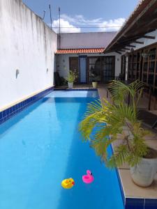 Swimmingpoolen hos eller tæt på Casa Aroma do Mar + 3 billeder