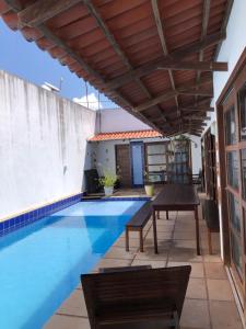 Swimmingpoolen hos eller tæt på Casa Aroma do Mar