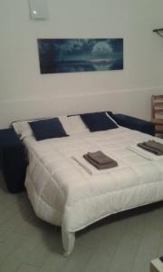 Postel nebo postele na pokoji v ubytování Appartamento Shabby Chic