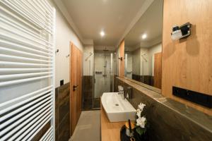 Koupelna v ubytování LAMBERT Residences + 37 fotografií
