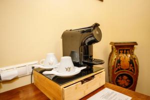 Kaffee-/Teezubehör in der Unterkunft Salvator Hotel