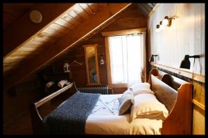 Uma cama ou camas num quarto em gite comme un accord