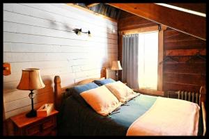 Uma cama ou camas num quarto em gite comme un accord