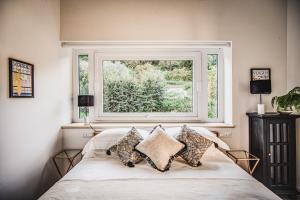 A bed or beds in a room at Vigna Caio Relais & Spa