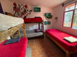 Postel nebo postele na pokoji v ubytování Historika Hostel Cultural