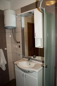 Koupelna v ubytování Apartments Martina