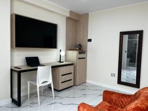 TV a/nebo společenská místnost v ubytování Residencial Mar Caribe