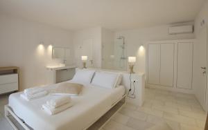 Кровать или кровати в номере Anemone Villas hotel