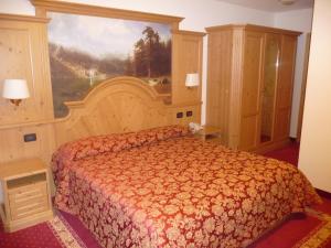 Posteľ alebo postele v izbe v ubytovaní Hotel Almazzago