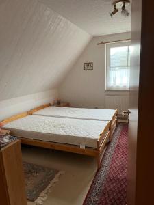 Postel nebo postele na pokoji v ubytování House in Rostock Gartenstadt