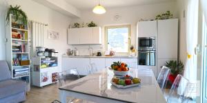 A kitchen or kitchenette at La Terrazza Family Holidays - Sorrento Coast