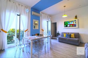 A television and/or entertainment centre at La Terrazza Family Holidays - Sorrento Coast