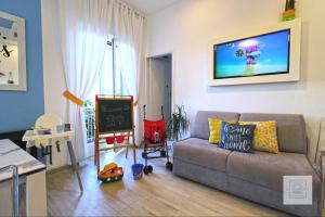 A television and/or entertainment centre at La Terrazza Family Holidays - Sorrento Coast