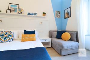 A bed or beds in a room at La Terrazza Family Holidays - Sorrento Coast