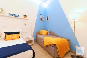 A bed or beds in a room at La Terrazza Family Holidays - Sorrento Coast