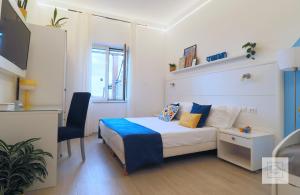 A bed or beds in a room at La Terrazza Family Holidays - Sorrento Coast