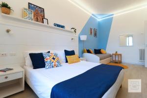 A bed or beds in a room at La Terrazza Family Holidays - Sorrento Coast