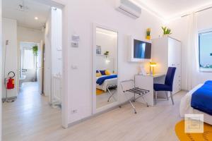 A television and/or entertainment centre at La Terrazza Family Holidays - Sorrento Coast