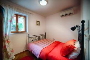 Postel nebo postele na pokoji v ubytování Villa Alma Komiza Island Vis