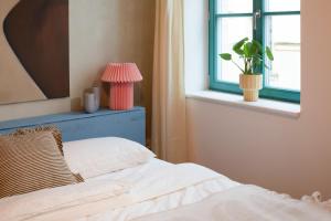 Ένα ή περισσότερα κρεβάτια σε δωμάτιο στο Loft Apartment in Hinterhof-Remise