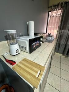 Kuchyň nebo kuchyňský kout v ubytování Exclusivo Condominio Minimalista #1