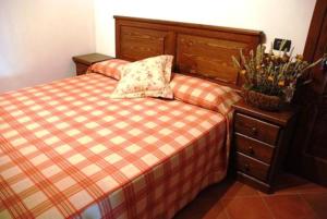 Un pat sau paturi într-o cameră la Affittacamere Il Contadino