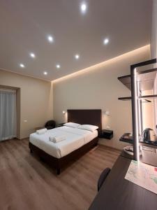 Postel nebo postele na pokoji v ubytování Colosseum Deluxe