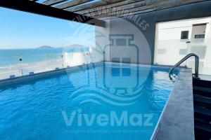 Bazén v ubytování Paraíso Costero con Vista al Mar nebo v jeho okolí