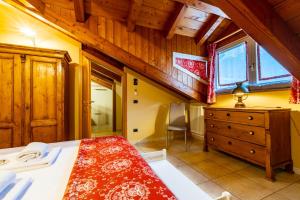Posteľ alebo postele v izbe v ubytovaní Inn Aosta Apartments