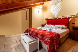 Posteľ alebo postele v izbe v ubytovaní Inn Aosta Apartments