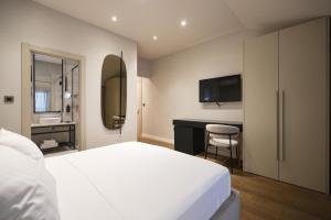 Giường trong phòng chung tại Rooms & Restaurant Matanovi Dvori