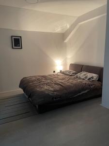 Ένα ή περισσότερα κρεβάτια σε δωμάτιο στο Fenix Apartman III +4 φωτογραφίες