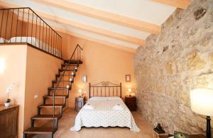 A bed or beds in a room at Tenuta Saracone