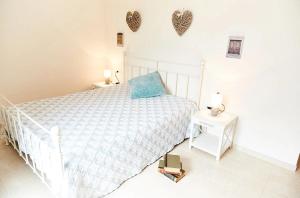 A bed or beds in a room at Tenuta Saracone