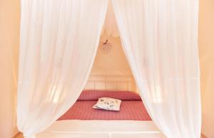 A bed or beds in a room at Tenuta Saracone