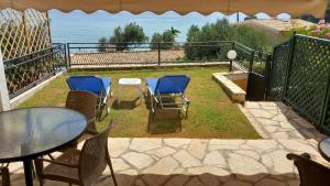 Balkón nebo terasa v ubytování Garden view to the sea Elpis Home 43