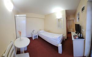 TV a/nebo společenská místnost v ubytování Guest House ANEX