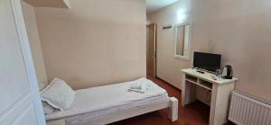 Postel nebo postele na pokoji v ubytování Guest House ANEX