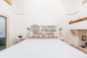 Ένα ή περισσότερα κρεβάτια σε δωμάτιο στο La Casina del Mare by Salento Prime