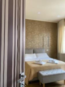 Postel nebo postele na pokoji v ubytování Le Due Torri ROOMS