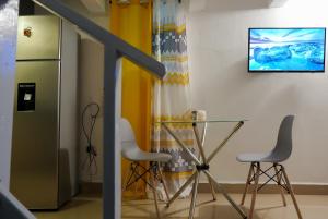 TV a/nebo společenská místnost v ubytování Casa Ballenas2