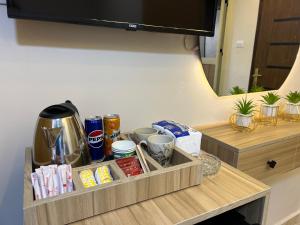 a tray with food and drinks on a table at Isis Pyramids View Inn in Cairo