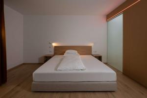 Postel nebo postele na pokoji v ubytování Best Western Hotel Spinnerei Linz