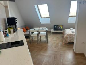 A bed or beds in a room at Ático by Alhaurín Loft City Center