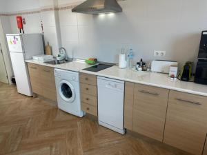 A kitchen or kitchenette at Ático by Alhaurín Loft City Center