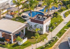 Bazén v ubytování Oasis costero Acogedora Casa Familiar nebo v jeho okolí