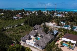 KidengaAmilsha Bungalow的海滩上房屋的空中景致